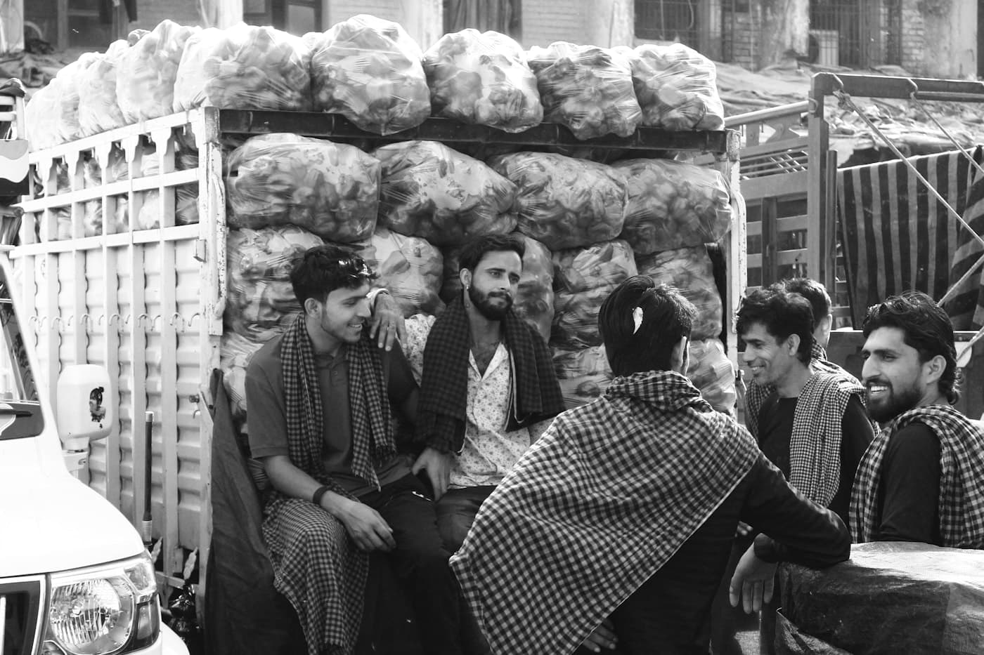 Friends in conversation at a local market
