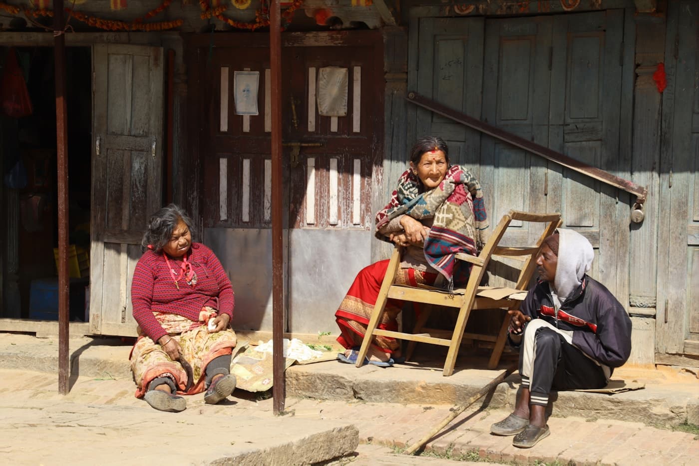 Neighbours talking outside their homes