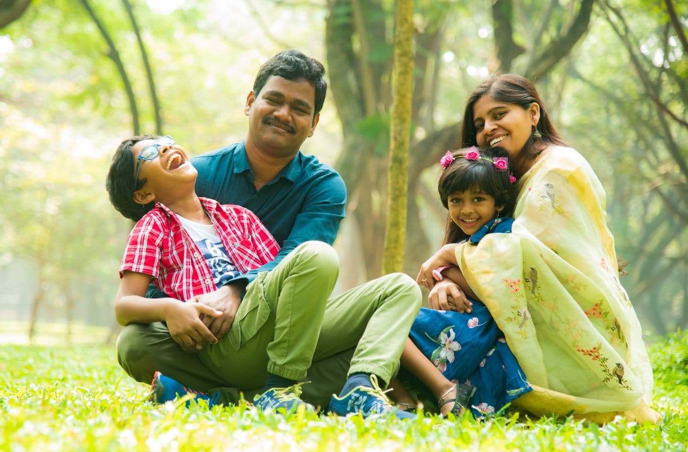 A family sharing a joyful moment outdoors